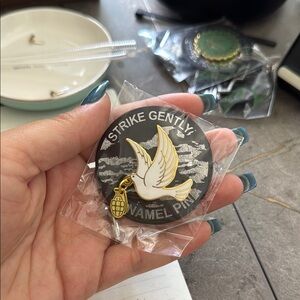 Strike Gently Dove Enamel Pin